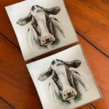 Platos decoupage para regalar León vaca frisona