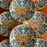 Platos decoupage para regalar León mariposas y pájaros