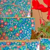 platos decoupage para regalar León flores rojas